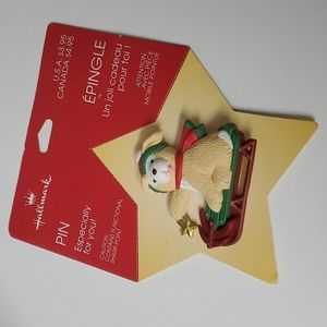 Free with purchase vintage unused Christmas Santa dog on sled brooch
